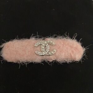 Pink fuzzy Hair Clip with iconic  Logo